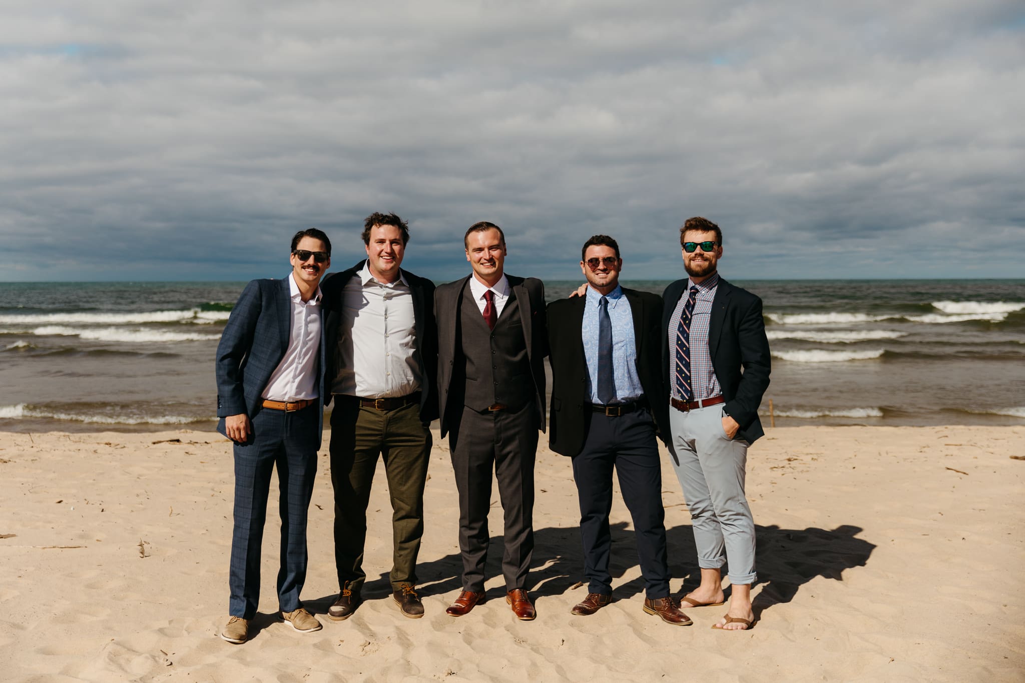 Family and friend group photos at the beach of Lake Michigan for a wedding at Indiana Dunes National Park