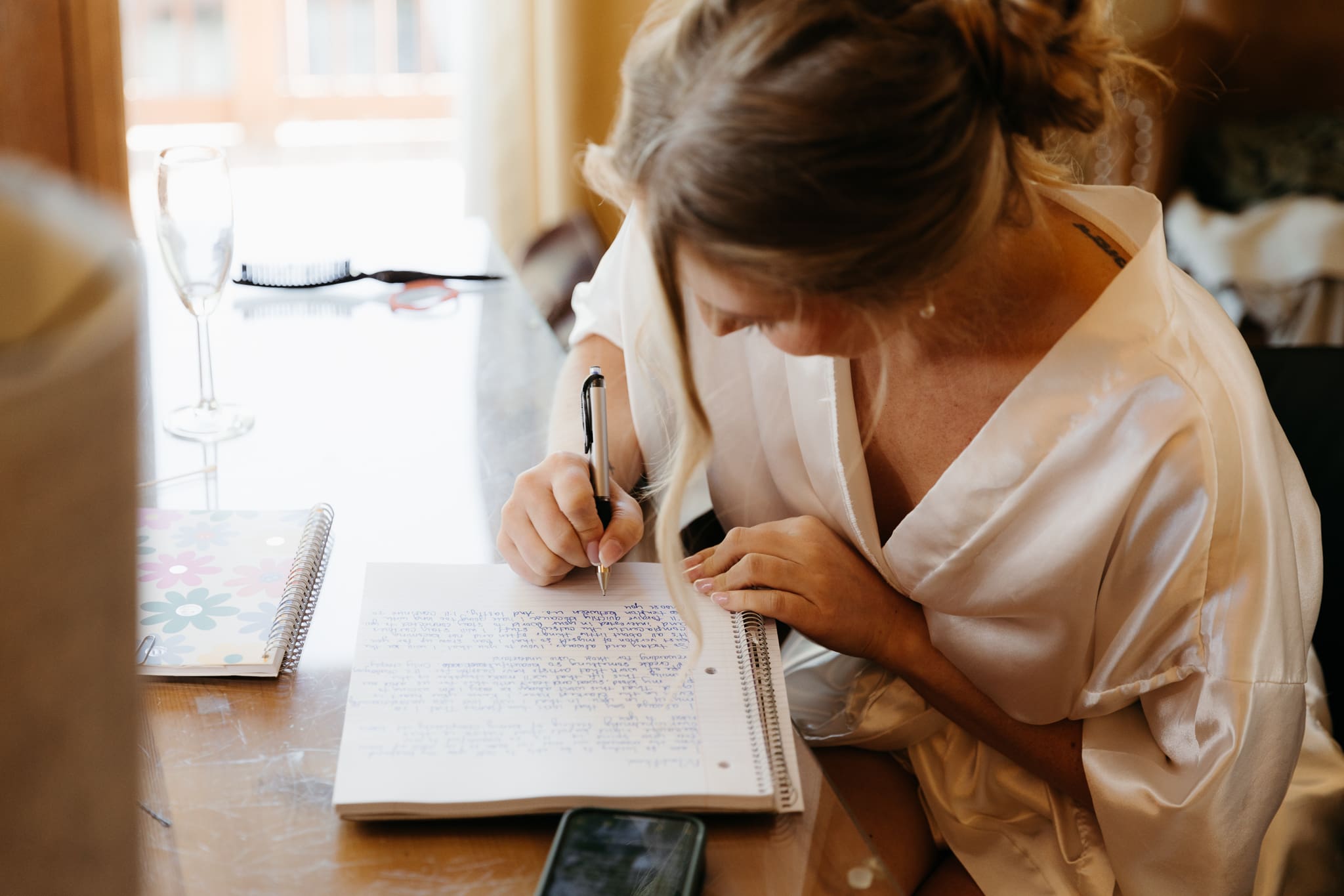 Bride getting ready and writing vows for her wedding at Indiana Dunes National Park