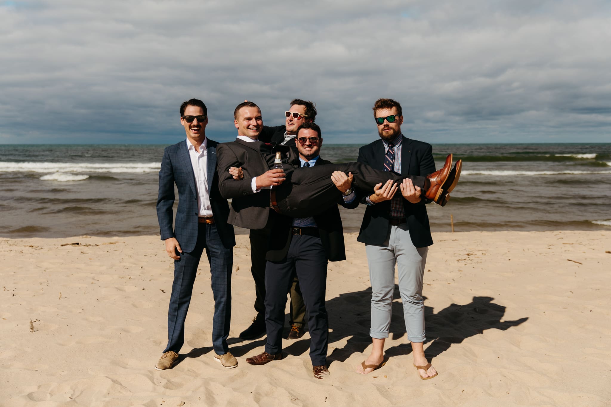 Family and friend group photos at the beach of Lake Michigan for a wedding at Indiana Dunes National Park