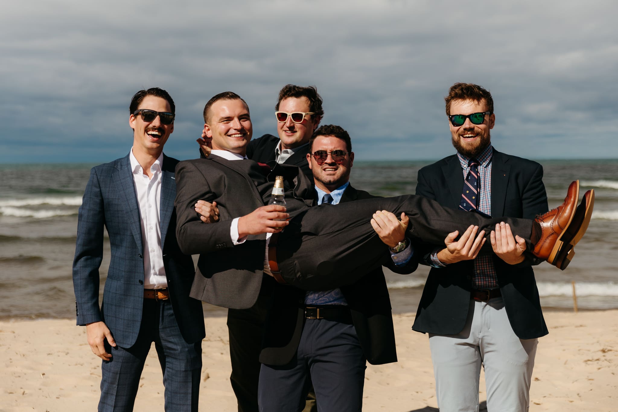 Family and friend group photos at the beach of Lake Michigan for a wedding at Indiana Dunes National Park