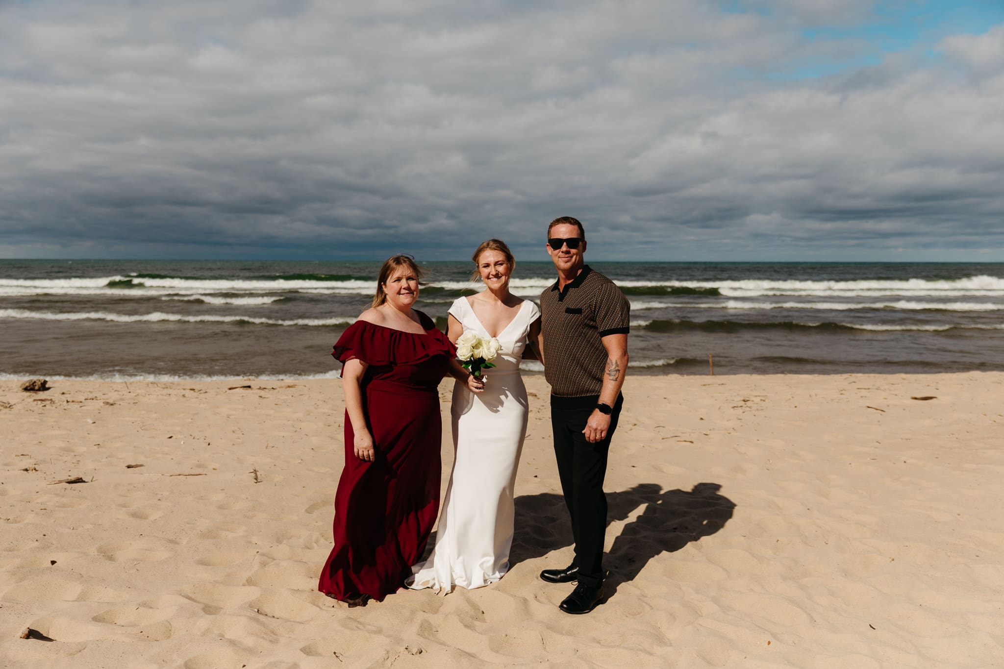 Family and friend group photos at the beach of Lake Michigan for a wedding at Indiana Dunes National Park
