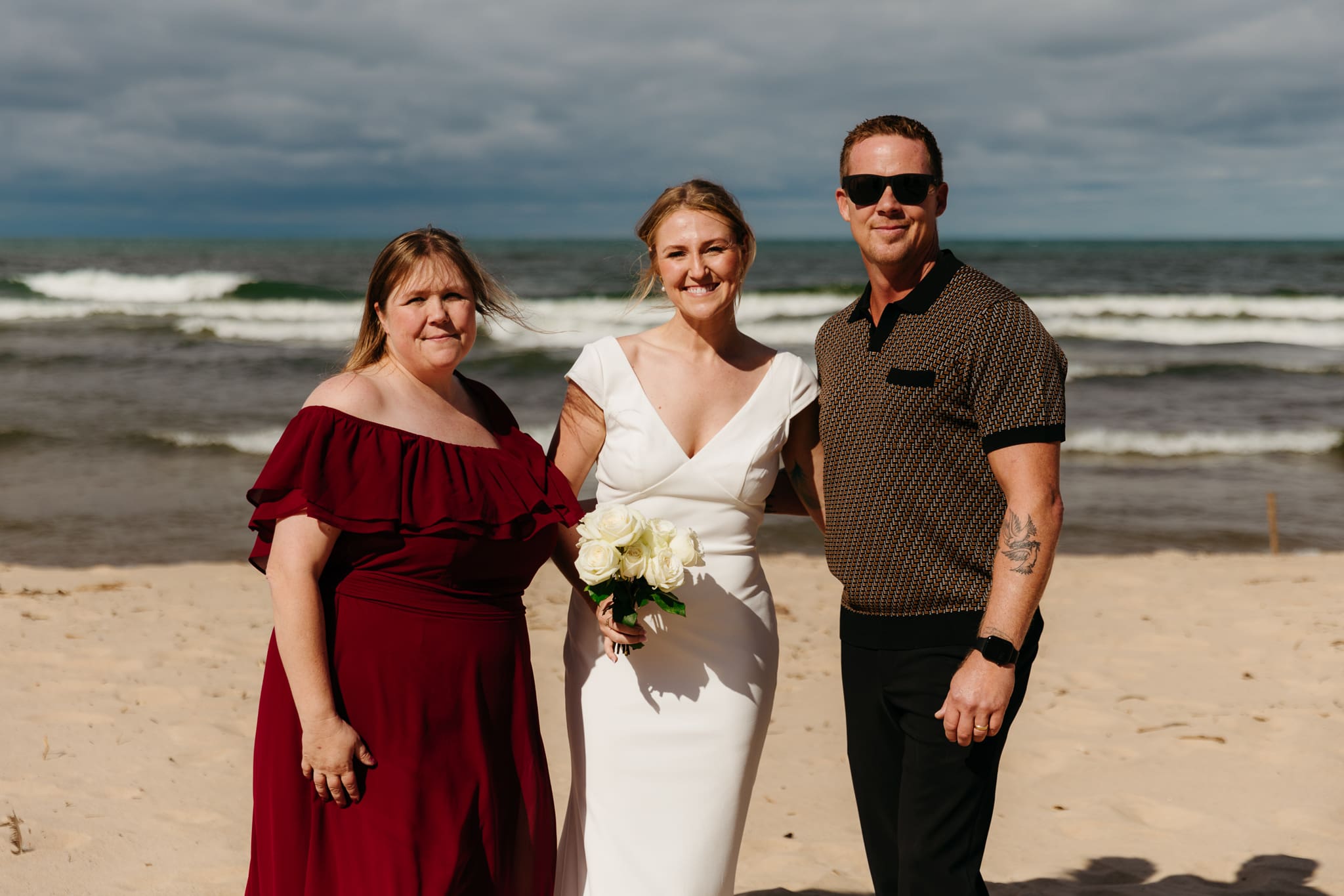 Family and friend group photos at the beach of Lake Michigan for a wedding at Indiana Dunes National Park