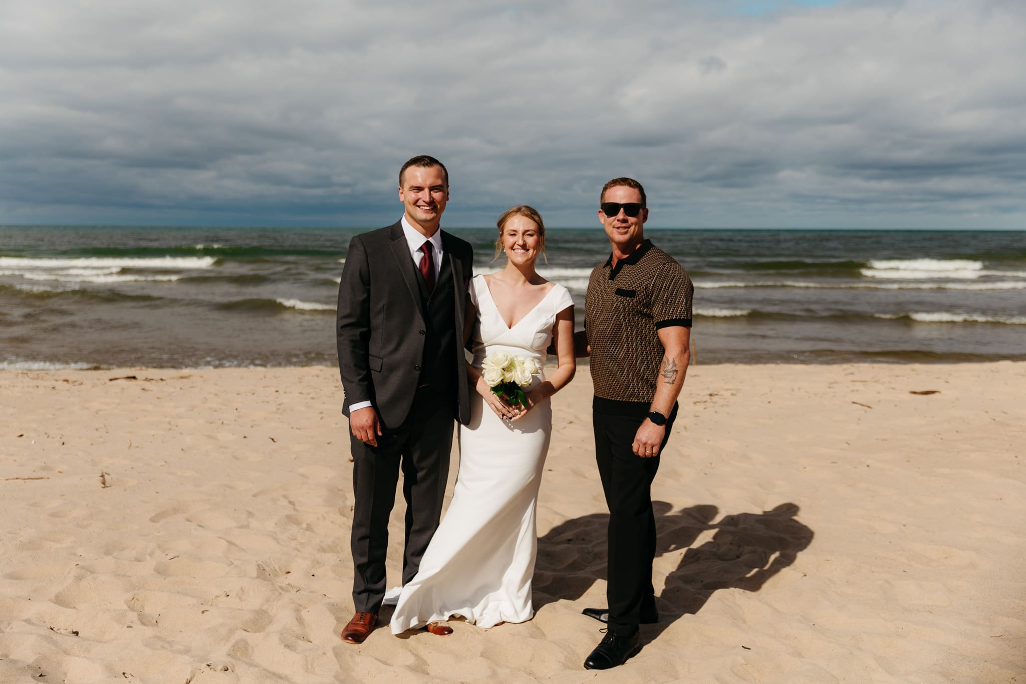 Family and friend group photos at the beach of Lake Michigan for a wedding at Indiana Dunes National Park