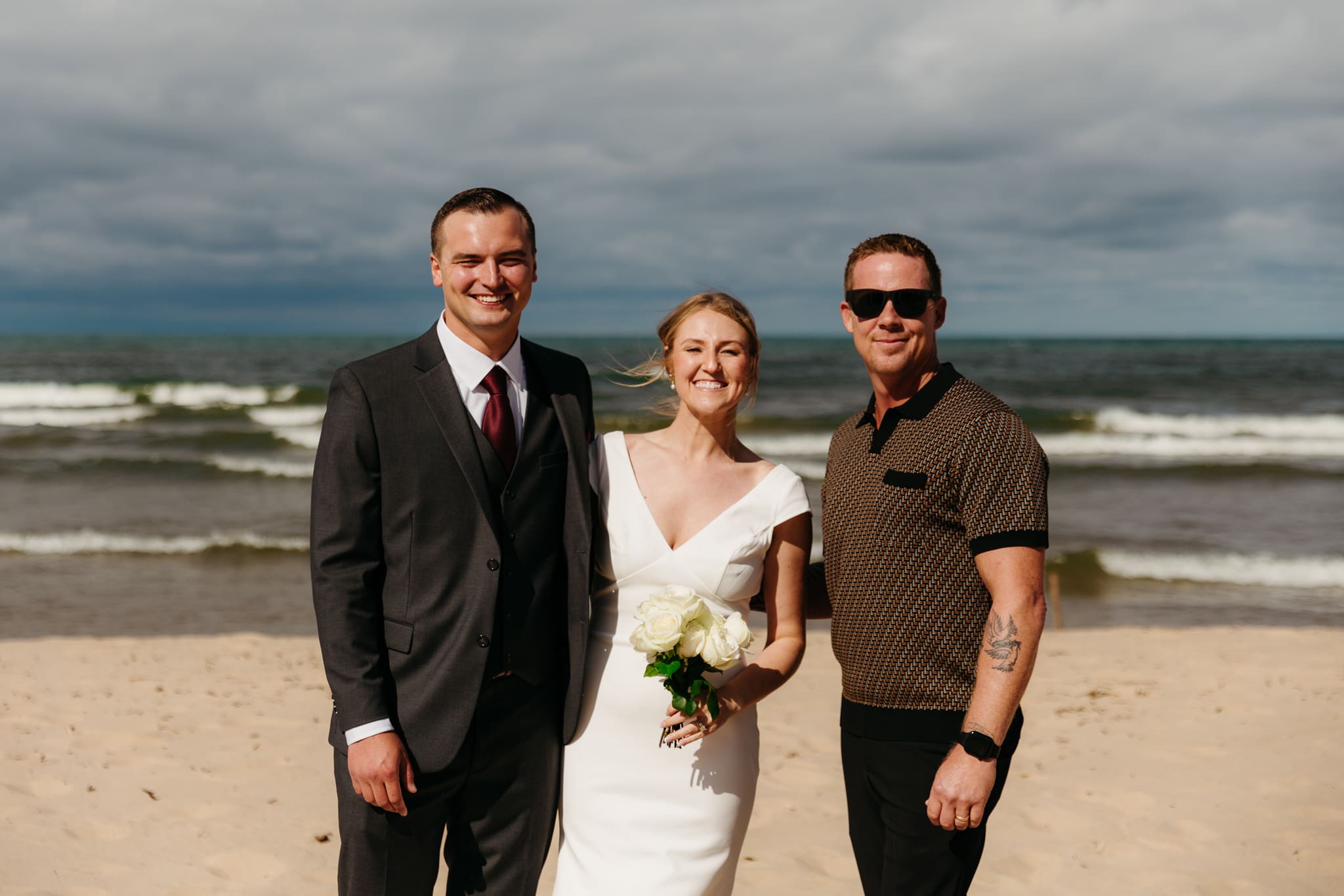 Family and friend group photos at the beach of Lake Michigan for a wedding at Indiana Dunes National Park