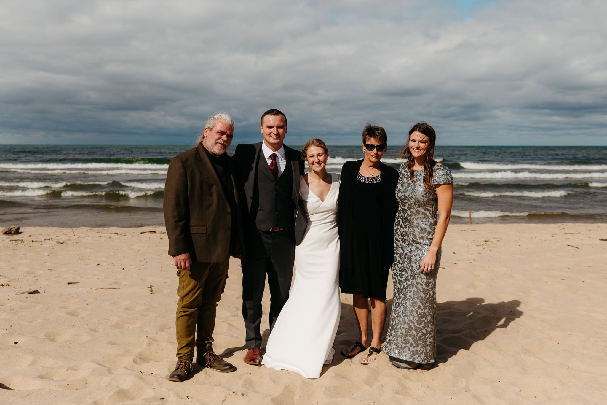 Family and friend group photos at the beach of Lake Michigan for a wedding at Indiana Dunes National Park