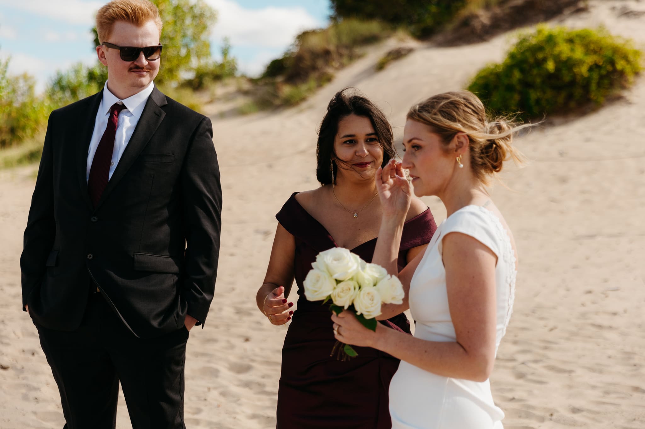 Family and friend group photos at the beach of Lake Michigan for a wedding at Indiana Dunes National Park