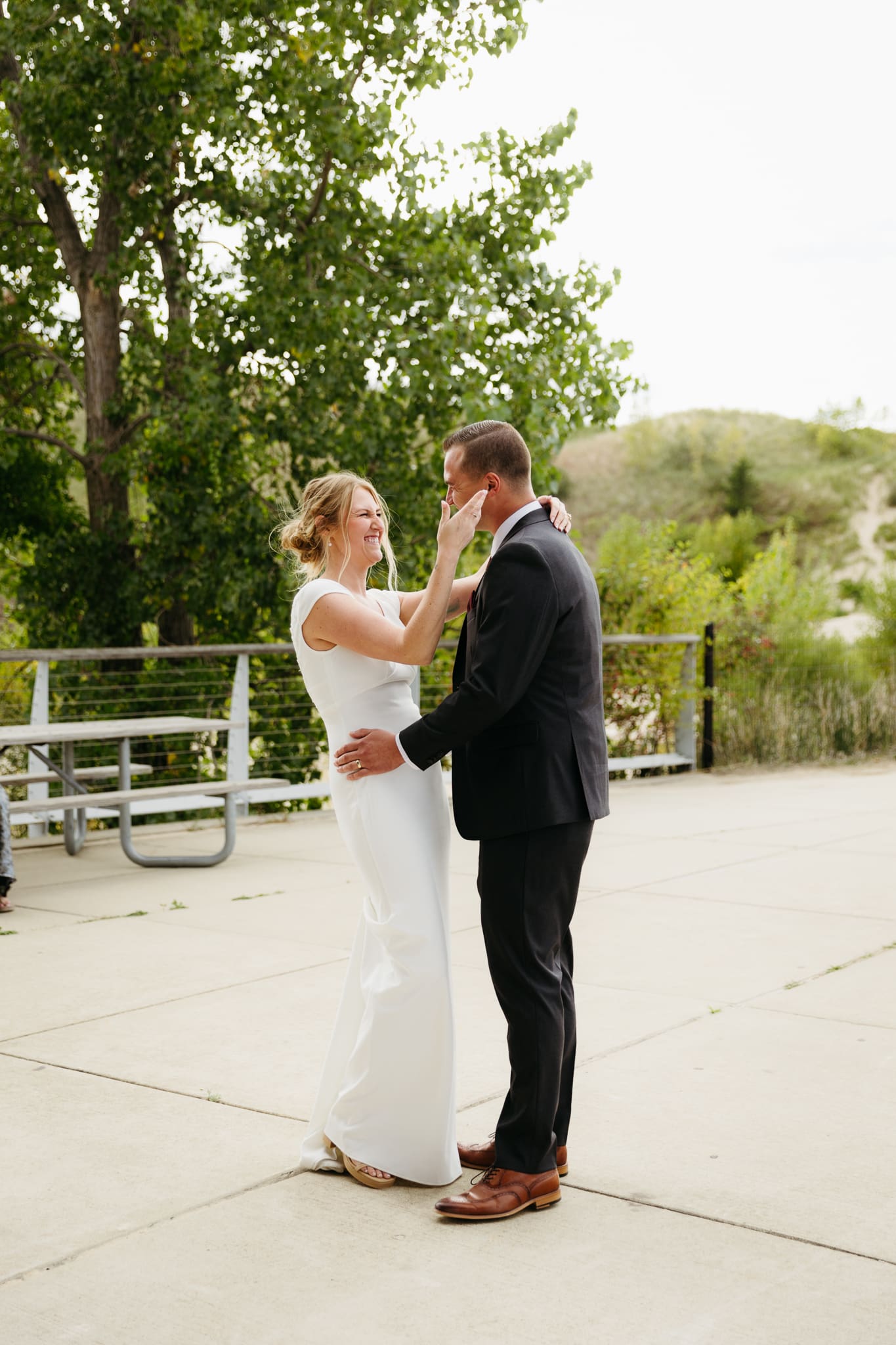 Bride and groom share a first dance during their wedding at Indiana Dunes National Park