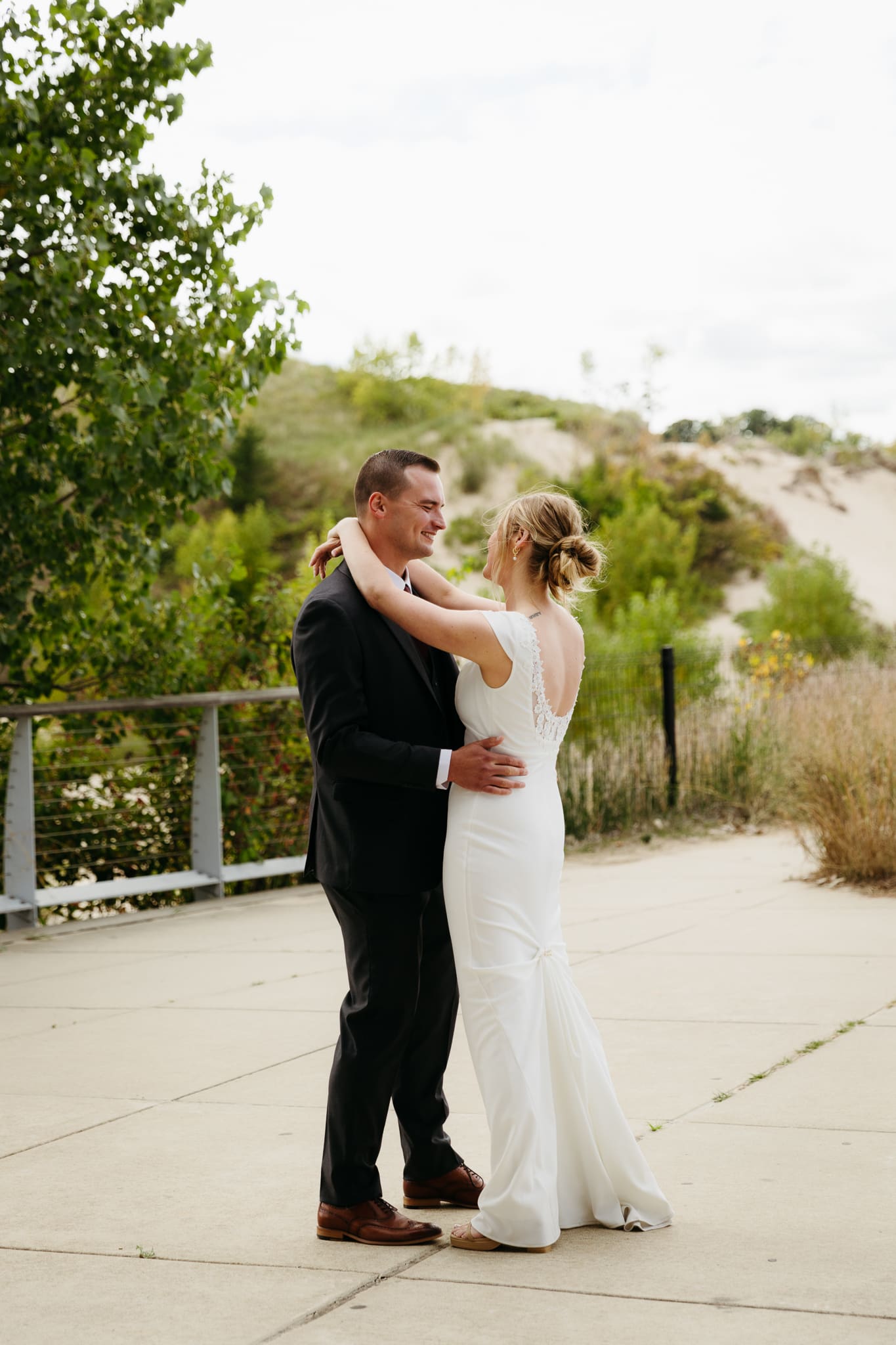 Bride and groom share a first dance during their wedding at Indiana Dunes National Park