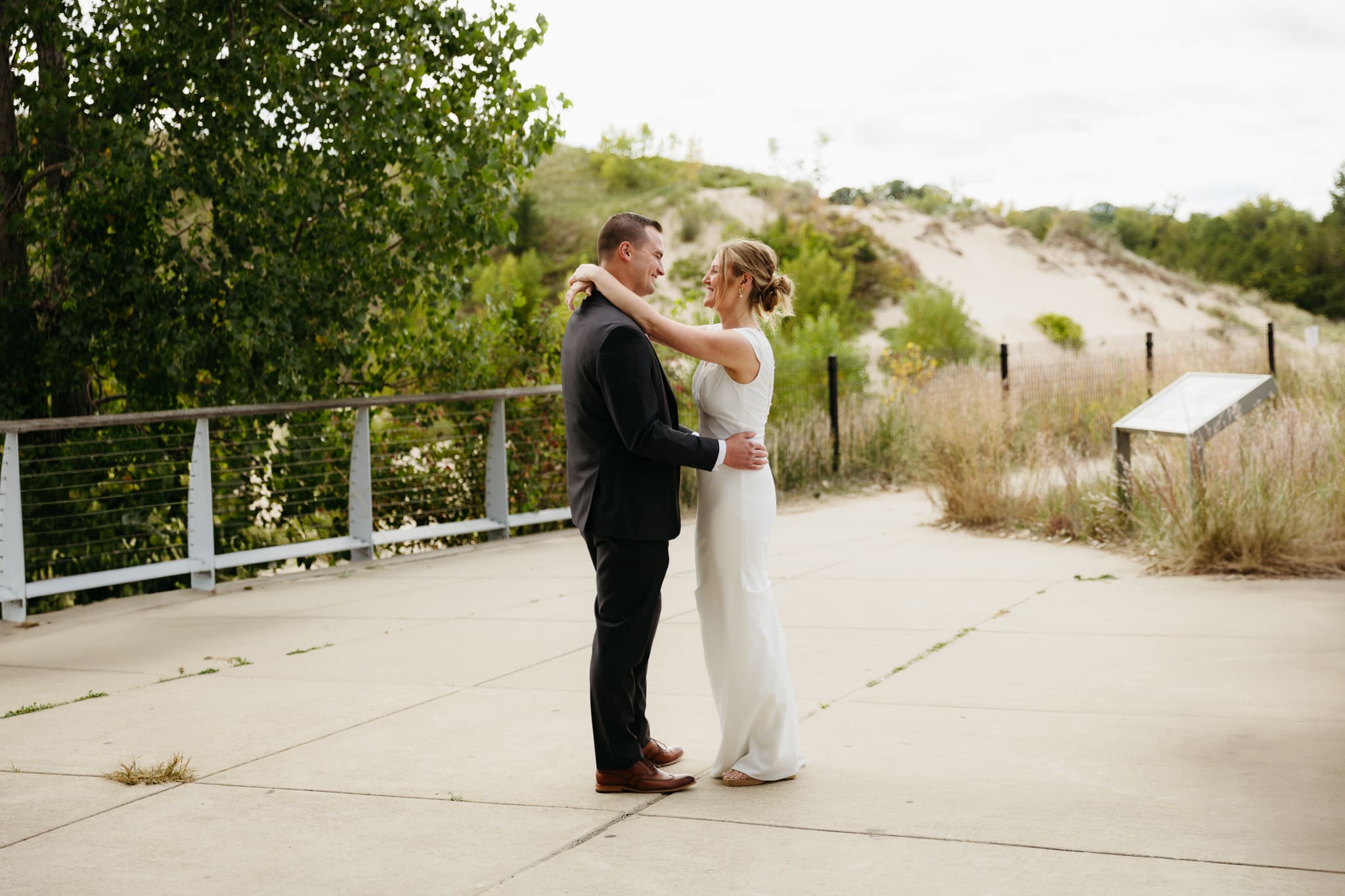 Bride and groom share a first dance during their wedding at Indiana Dunes National Park