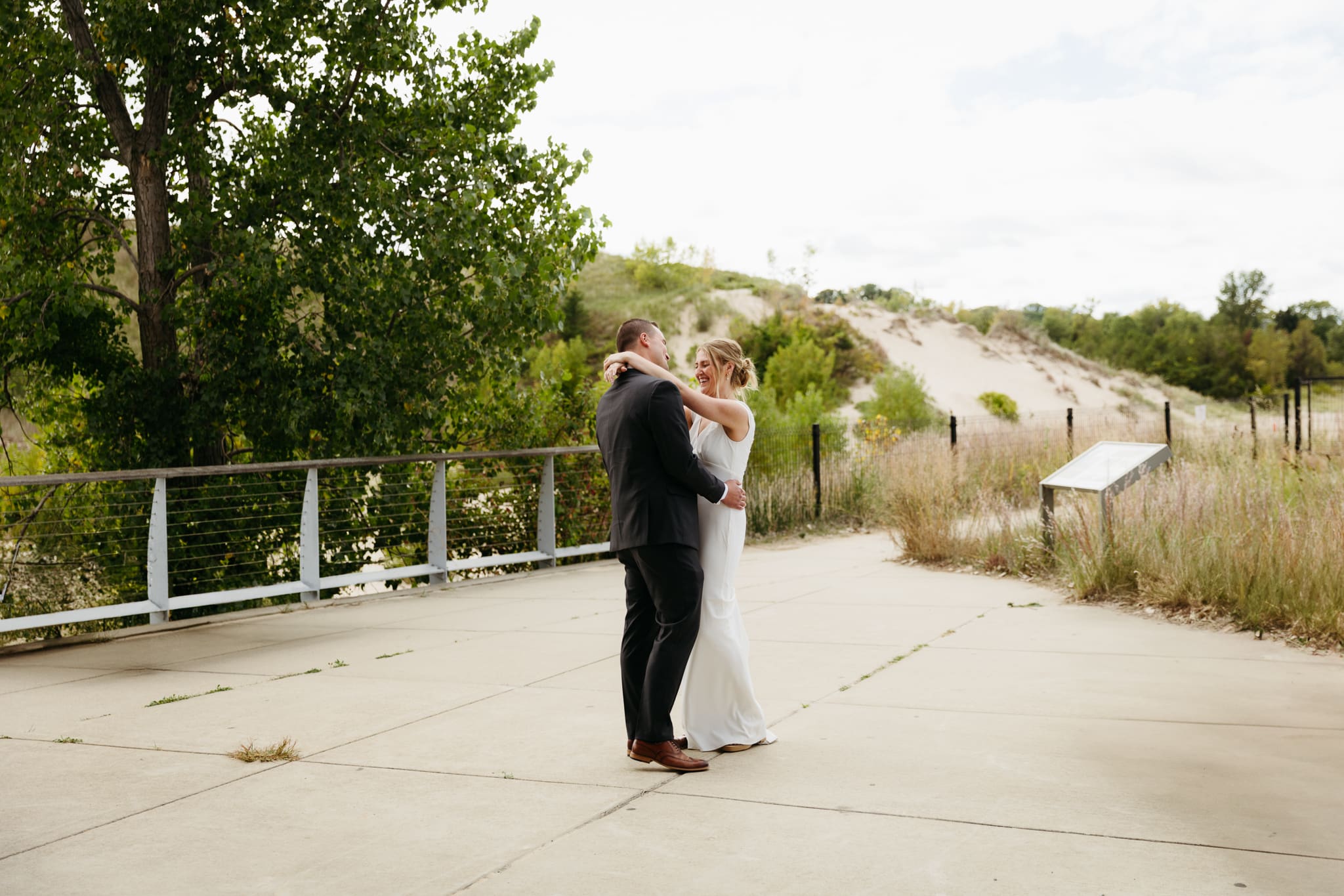 Bride and groom share a first dance during their wedding at Indiana Dunes National Park
