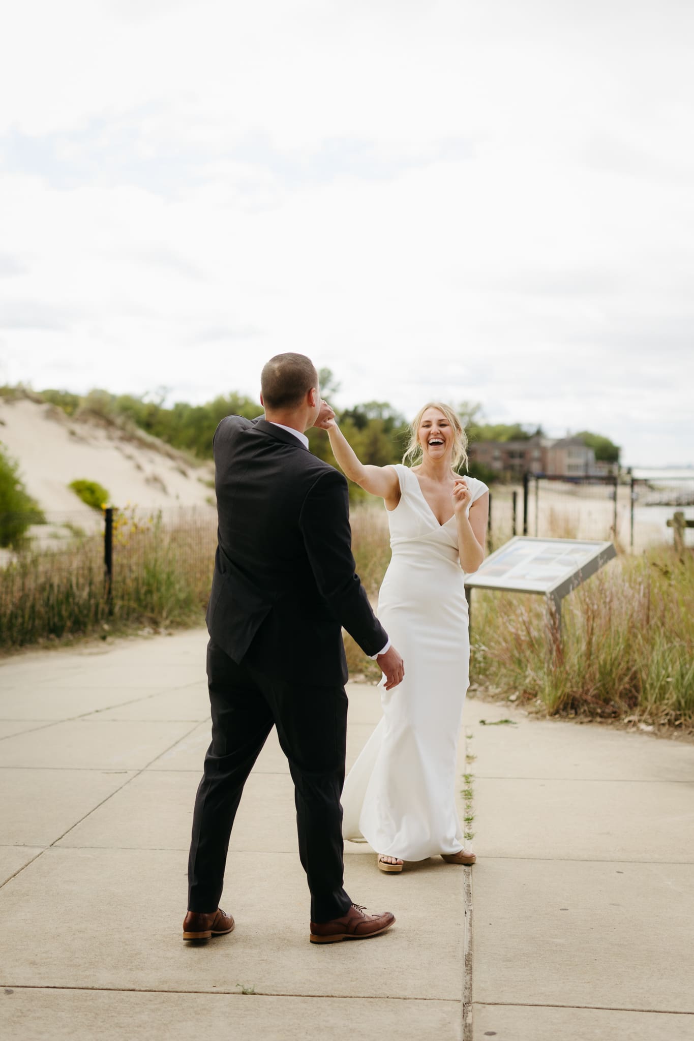 Bride and groom share a first dance during their wedding at Indiana Dunes National Park