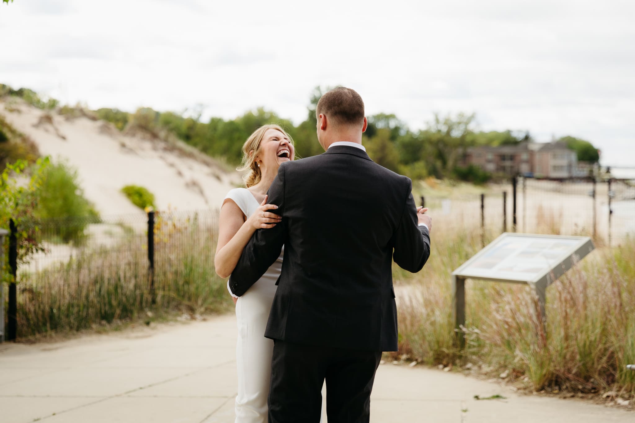Bride and groom share a first dance during their wedding at Indiana Dunes National Park