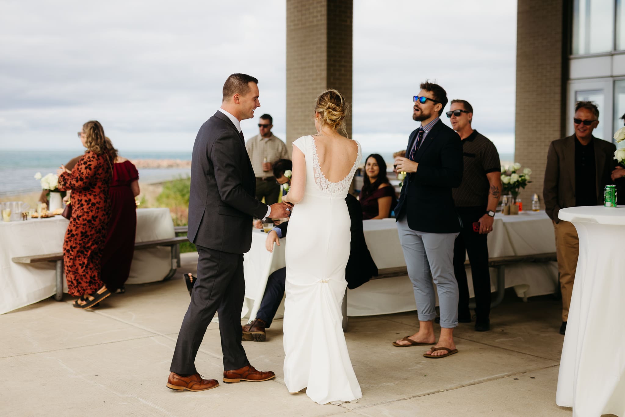 Bride and groom share a first dance during their wedding at Indiana Dunes National Park