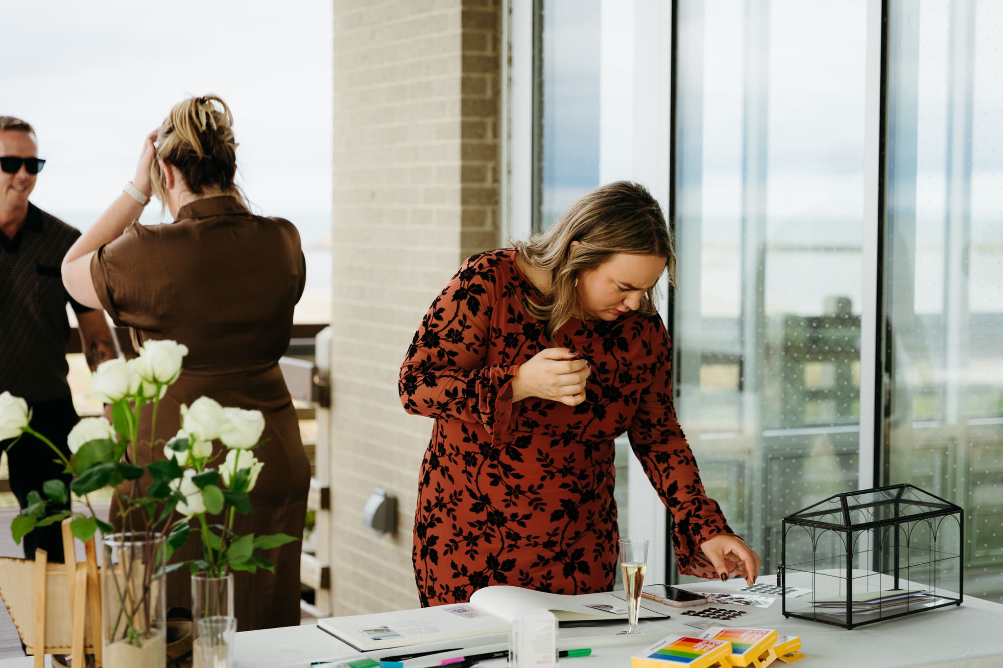 Bride and groom hanging out with family and friends during their outdoor wedding at Indiana Dunes National Park