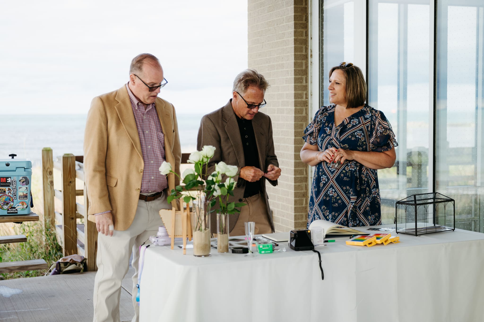 Family and friends hanging out and celebrating during a wedding at Indiana Dunes