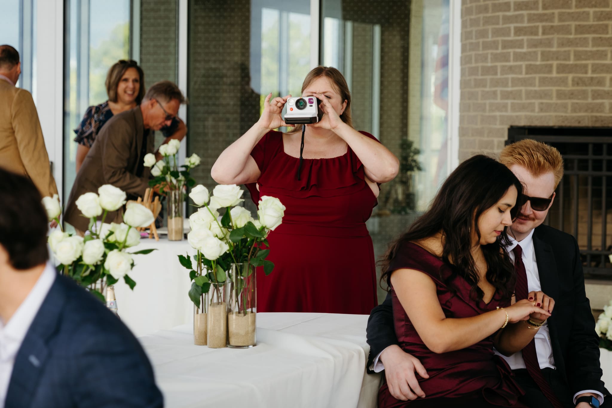 Family and friends hanging out and celebrating during a wedding at Indiana Dunes
