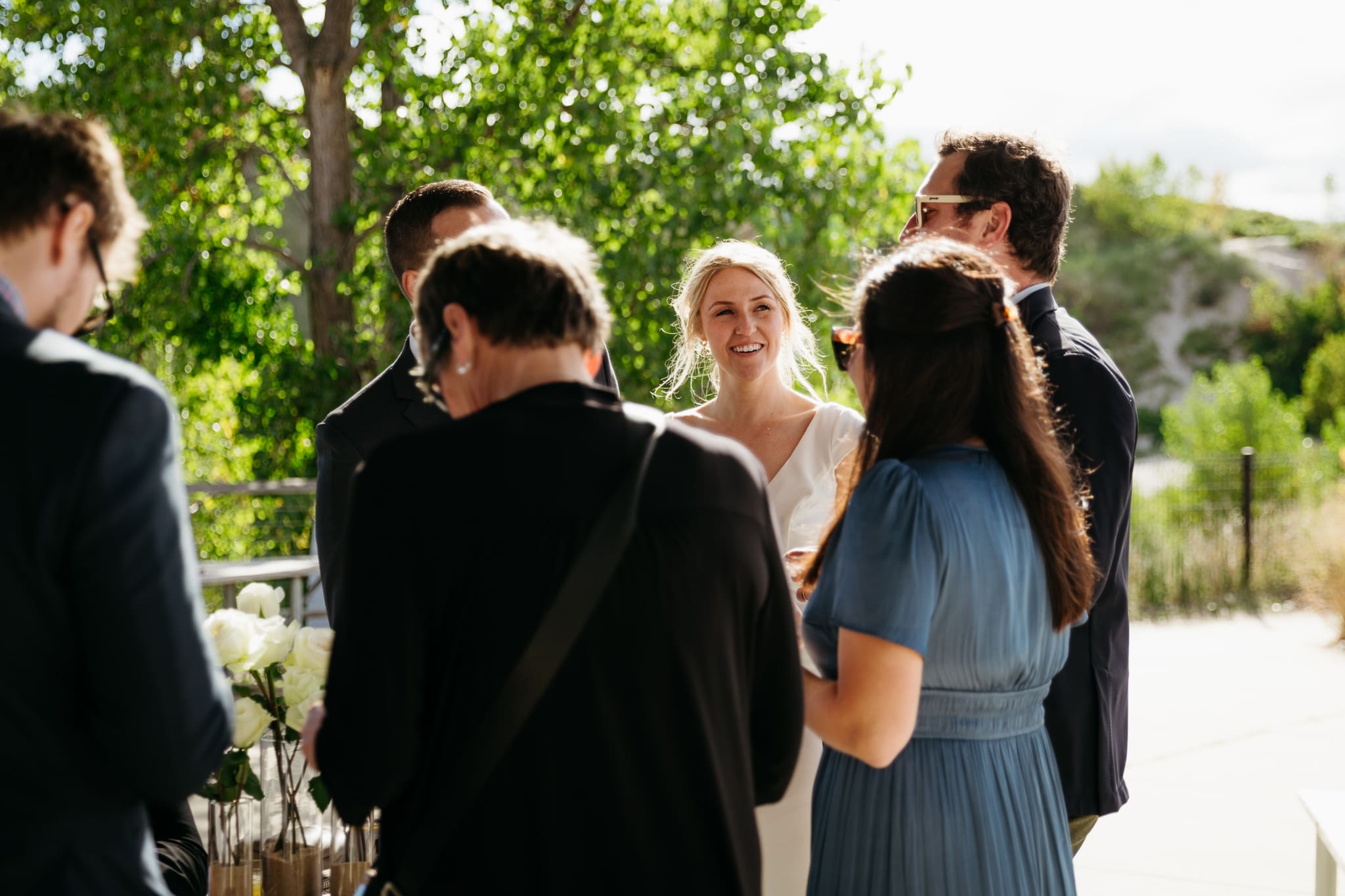 Family and friends hanging out and celebrating during a wedding at Indiana Dunes