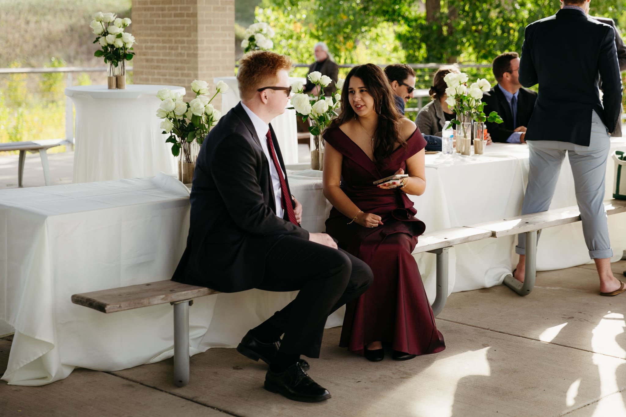 Family and friends hanging out and celebrating during a wedding at Indiana Dunes