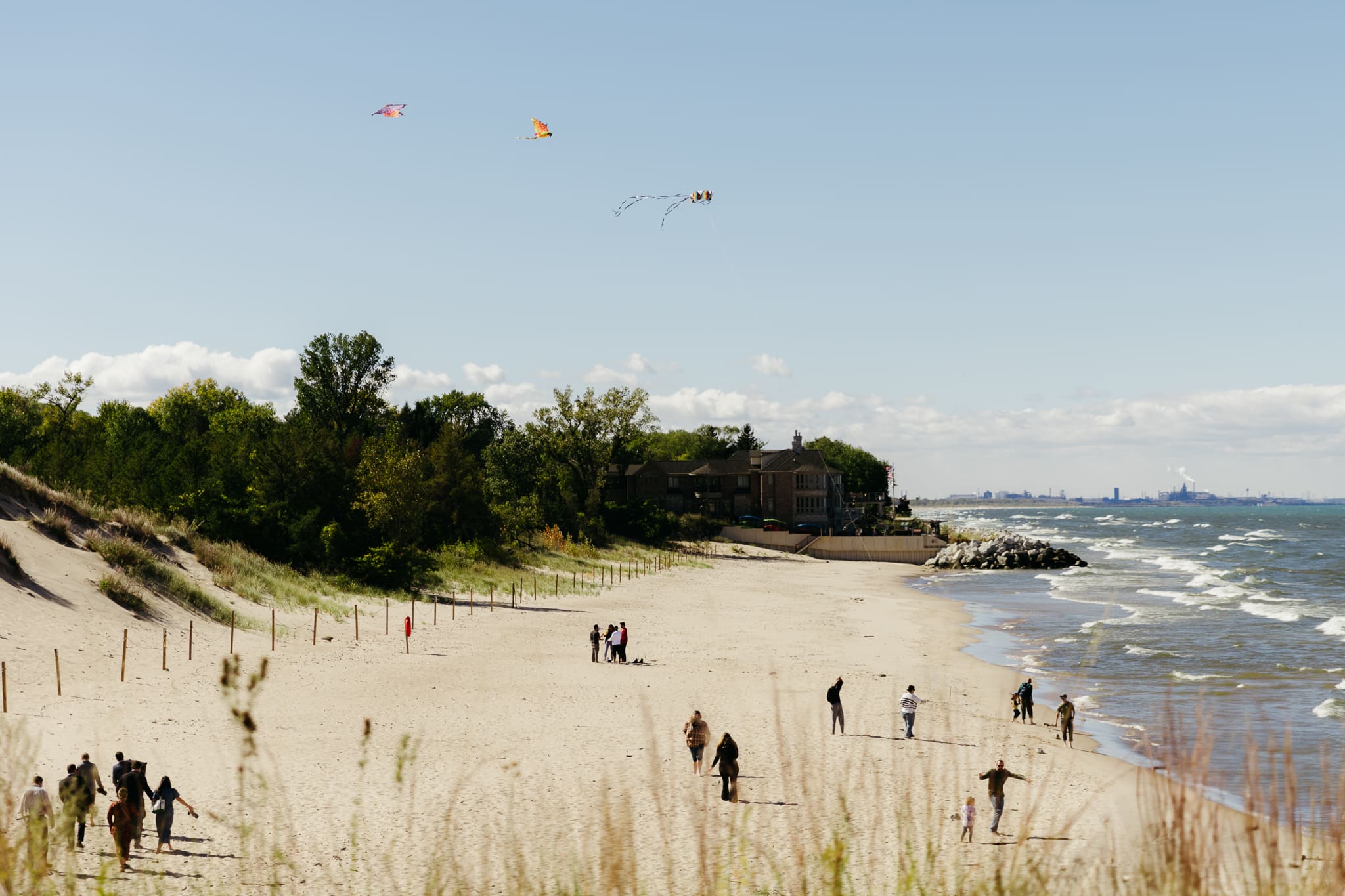 Family and friends set up the Pavilion at Indiana Dunes National Park for a beachside intimate wedding.
