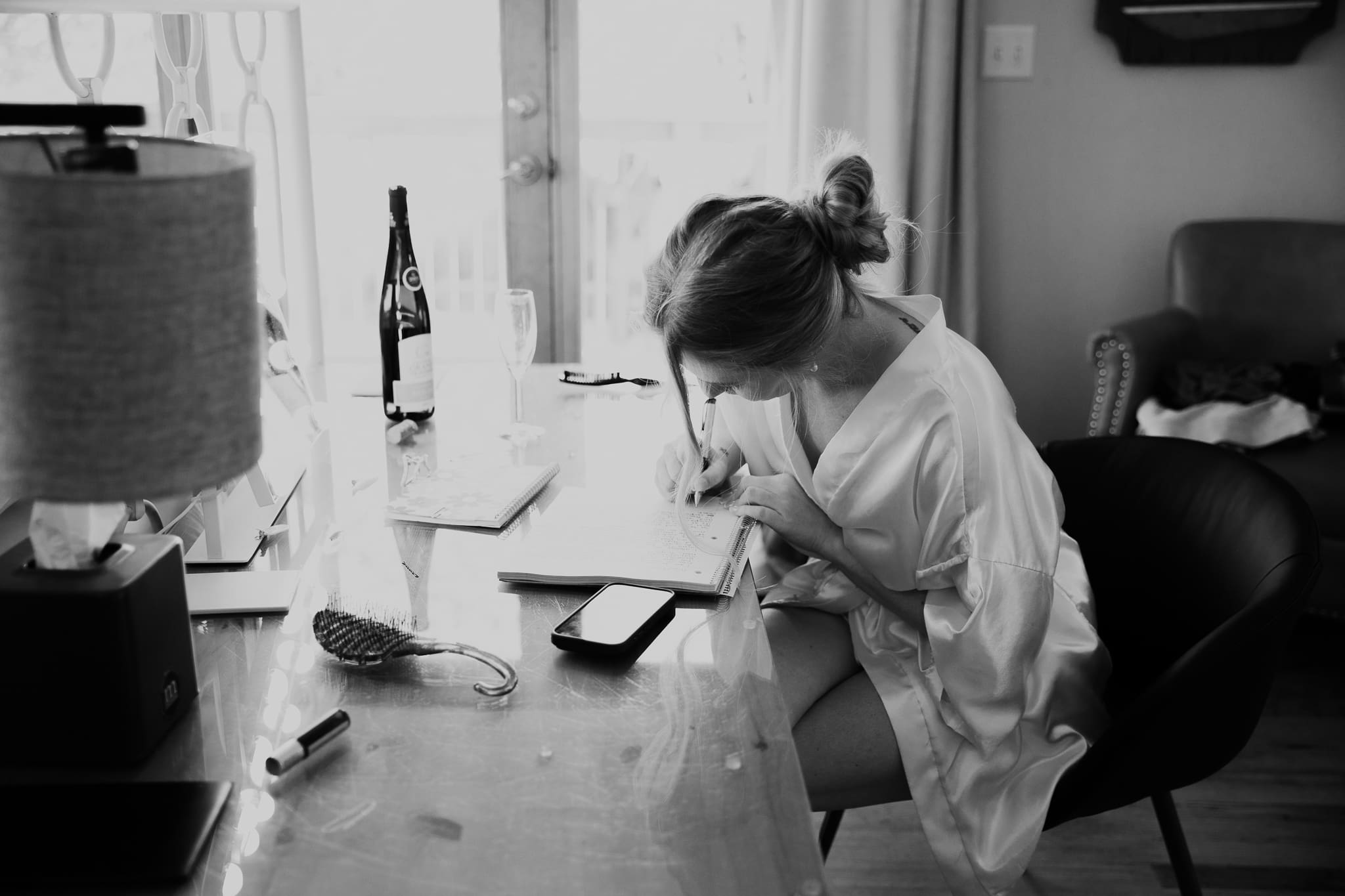 Bride getting ready and writing vows for her wedding at Indiana Dunes National Park