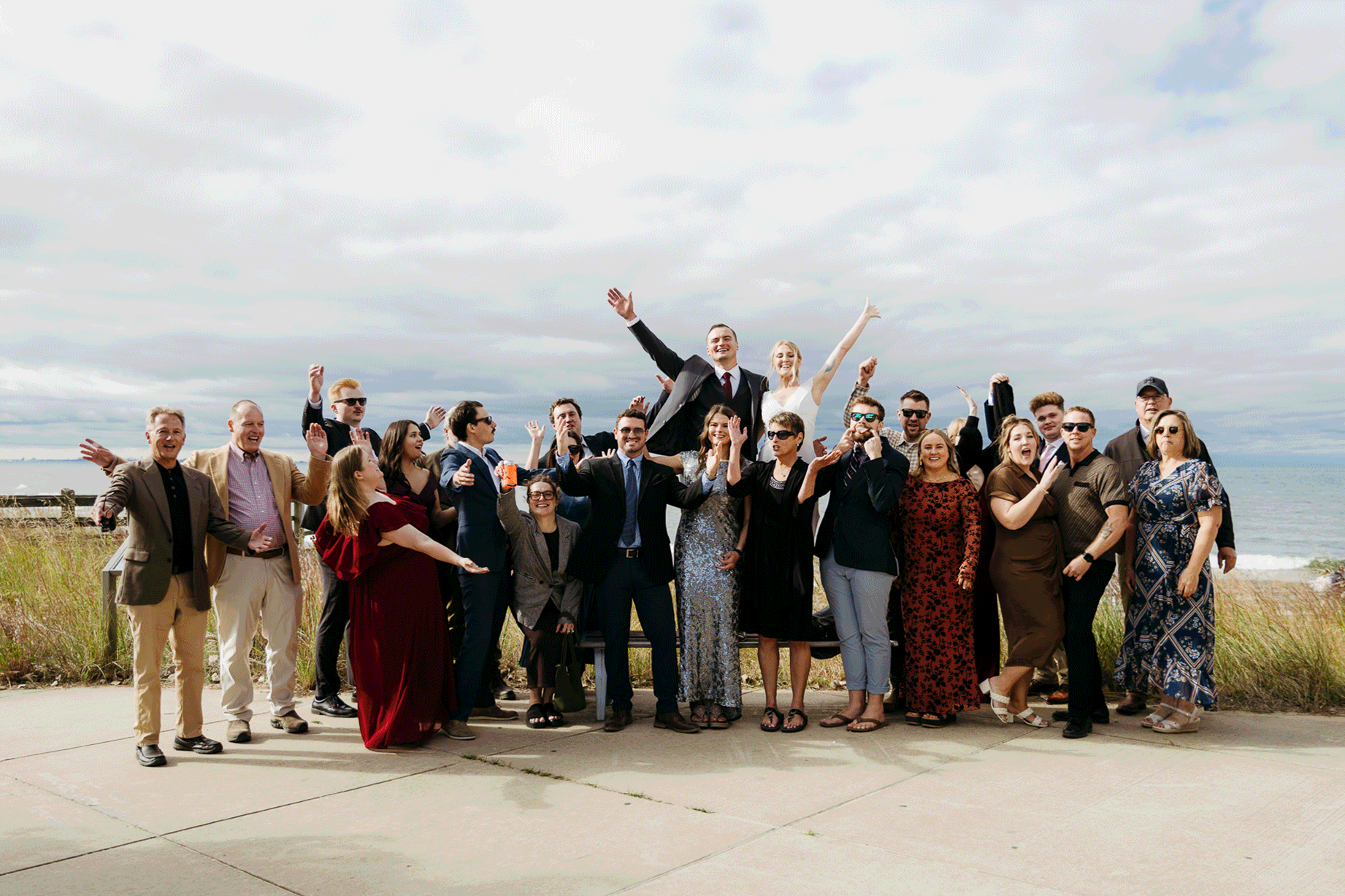 Family and friends hanging out and celebrating during a wedding at Indiana Dunes National Park